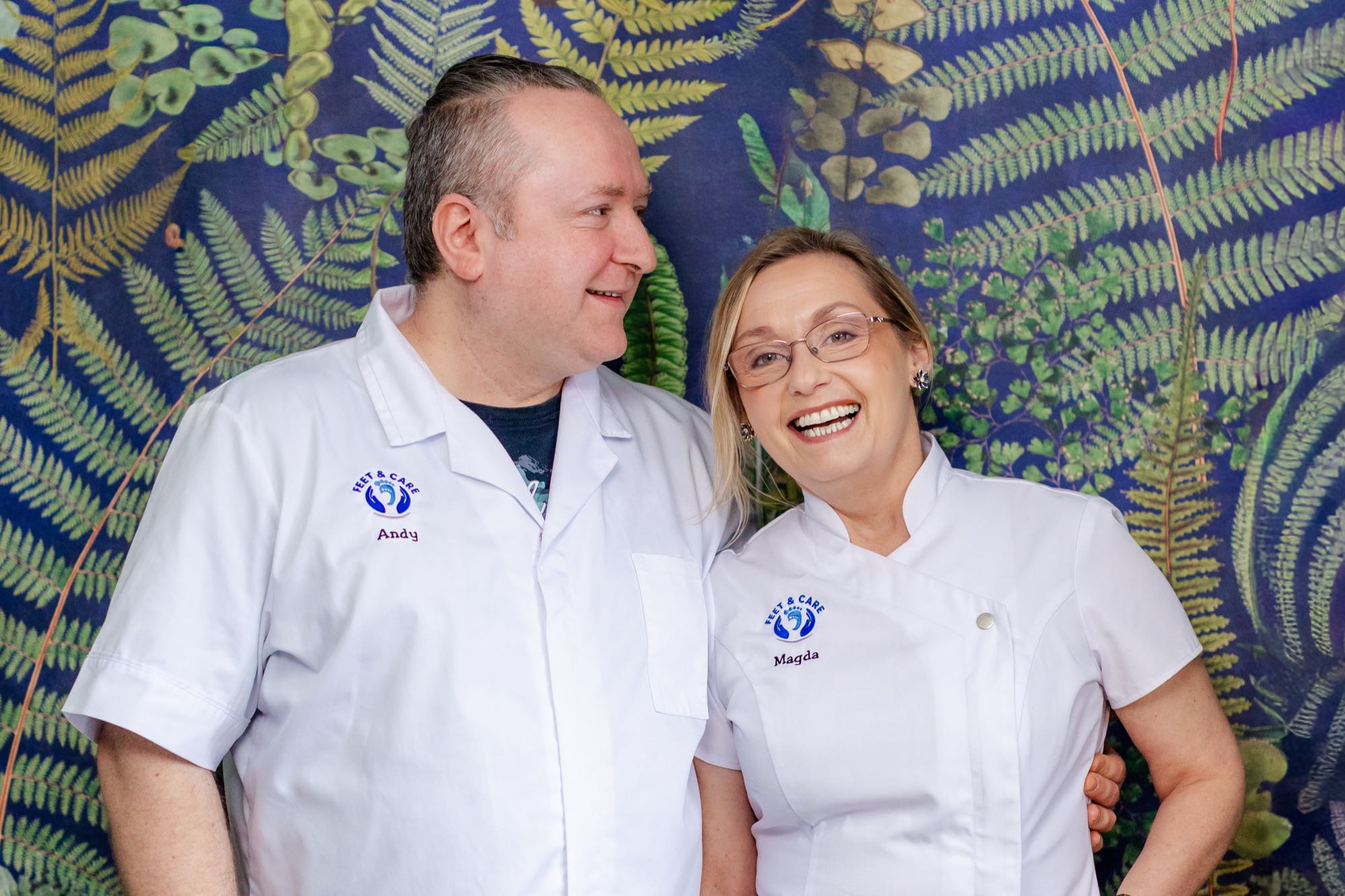 Magda and Andy of Feet & Care, sharing a laugh in the clinic
